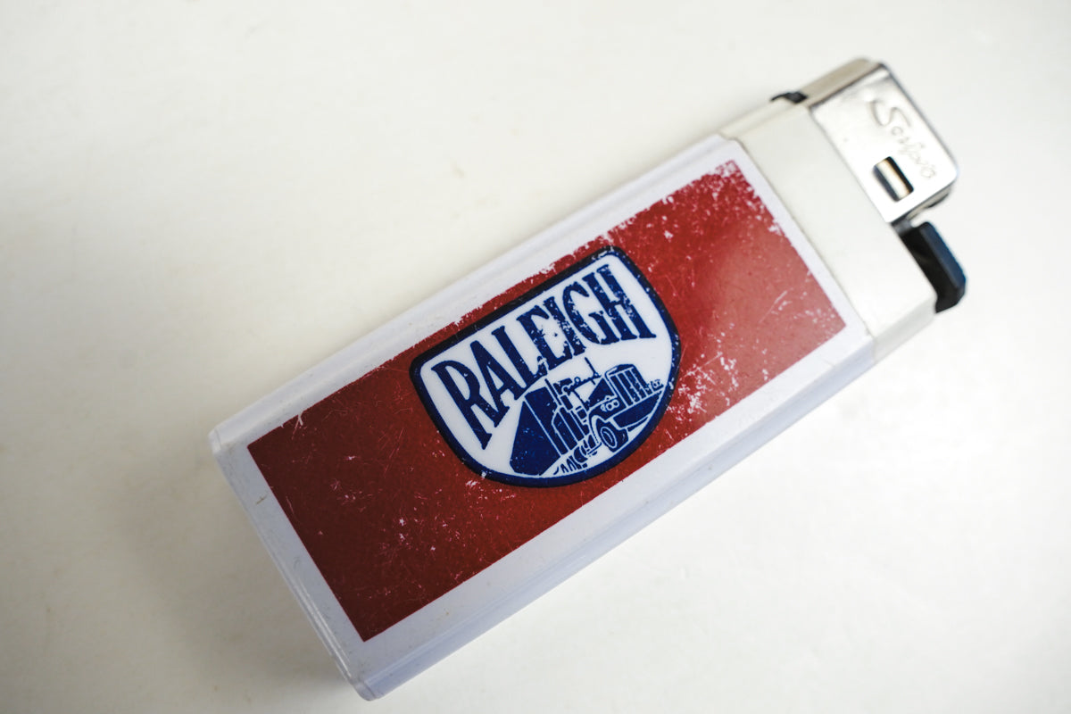 Raleigh Trucking Cigarette Lighter White with Red & Blue