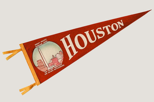 Red and white vintage-style pennant with 'Houston' text and skyline illustration on a white background