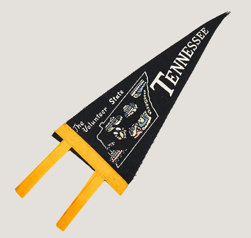 Black and yellow Tennessee-themed pennant with state outline design on a white background