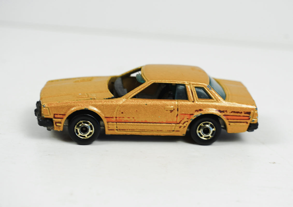 1981 Hot Wheels Datsun 200SX Gold Metal Flake 1:64 Scale Die Cast Car