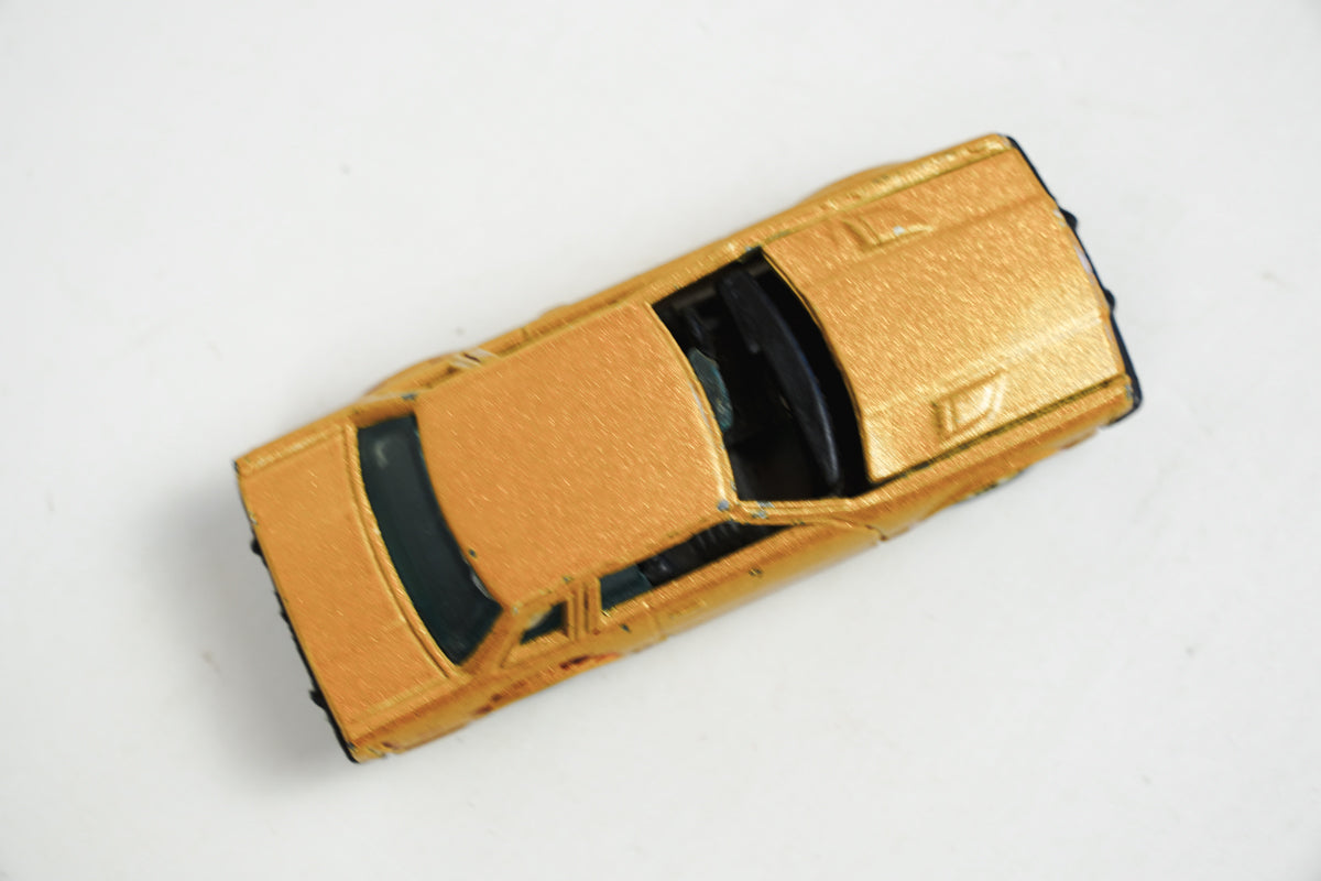 1981 Hot Wheels Datsun 200SX Gold Metal Flake 1:64 Scale Die Cast Car