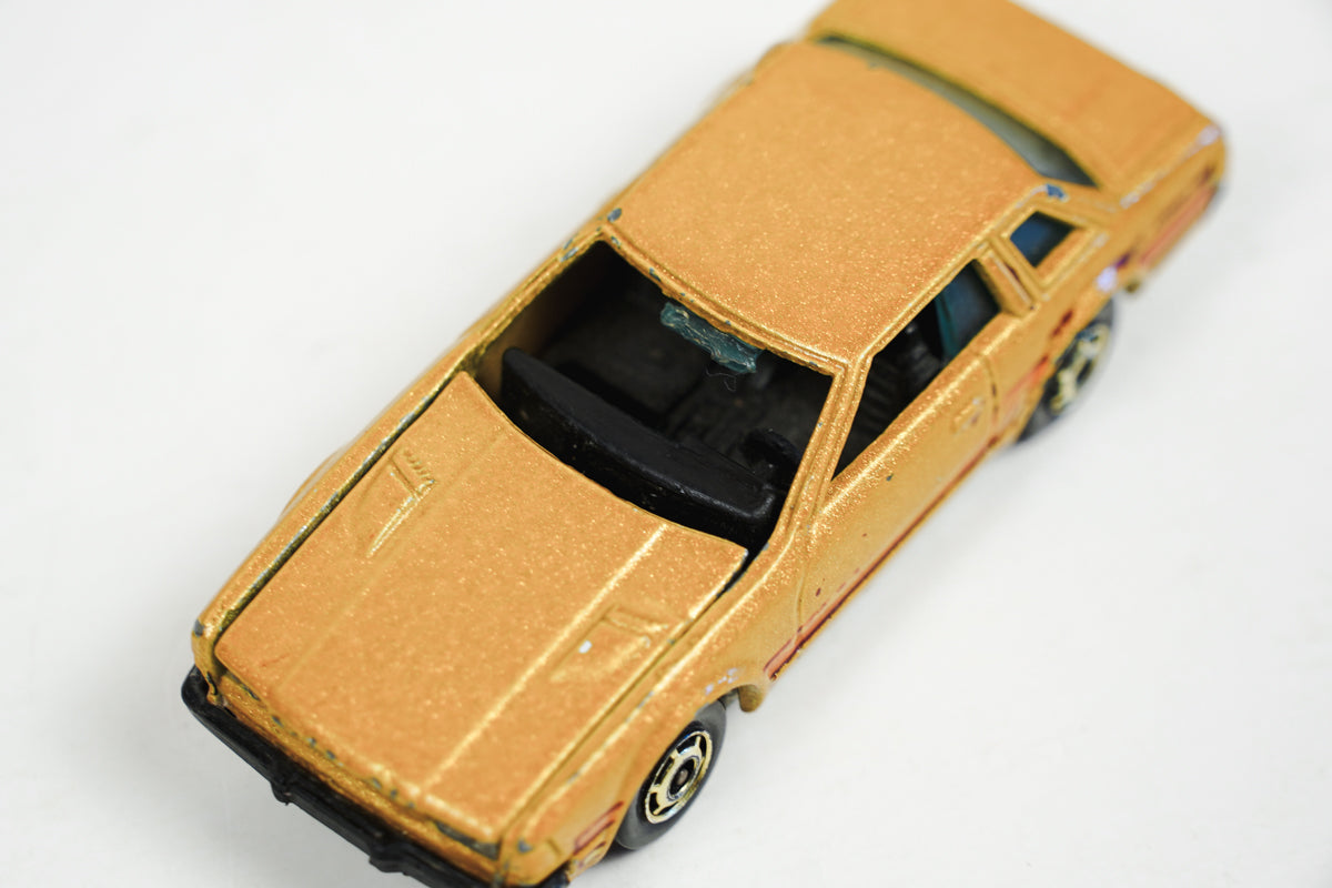 1981 Hot Wheels Datsun 200SX Gold Metal Flake 1:64 Scale Die Cast Car