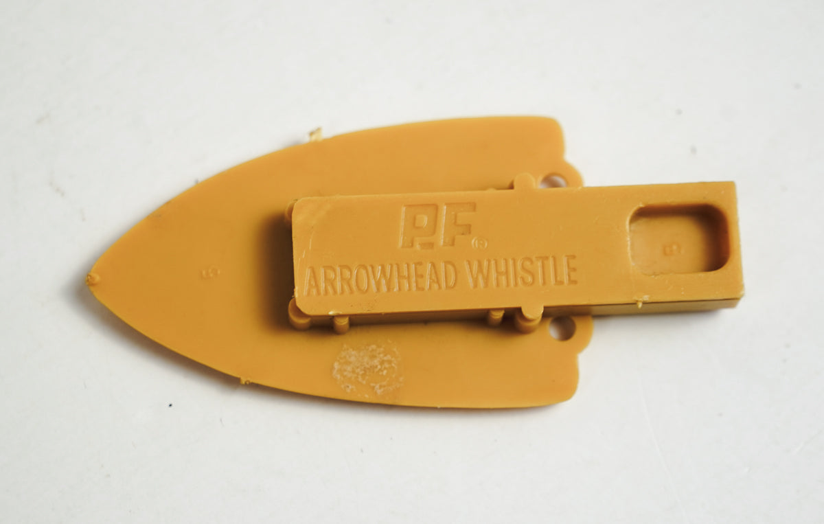 P.F. Flyers Arrowhead Whistle 1960s Indian Chief Head Yellow Plastic Whistle