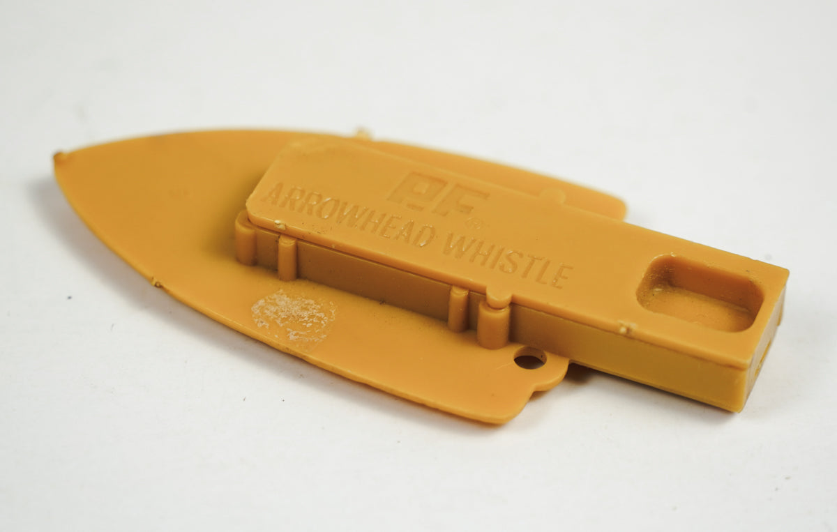 P.F. Flyers Arrowhead Whistle 1960s Indian Chief Head Yellow Plastic Whistle