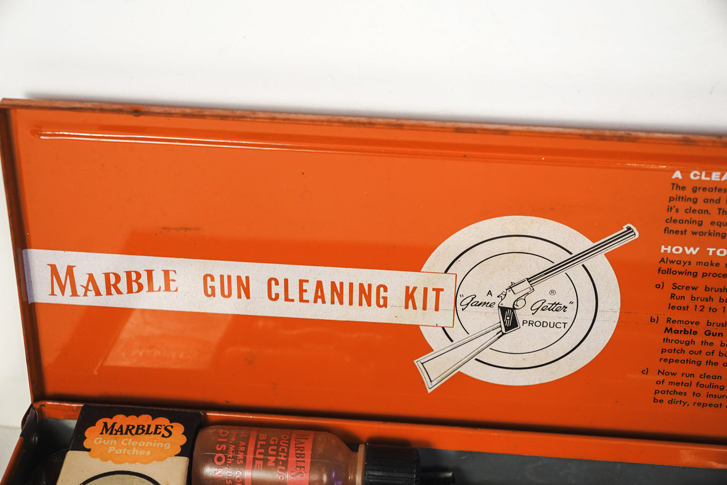 Vintage Marbles Gun Cleaning Kit Orange Tin with Almost All Original Parts EUC