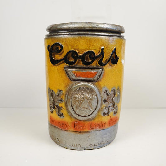 Coors beer can-shaped container on a white background